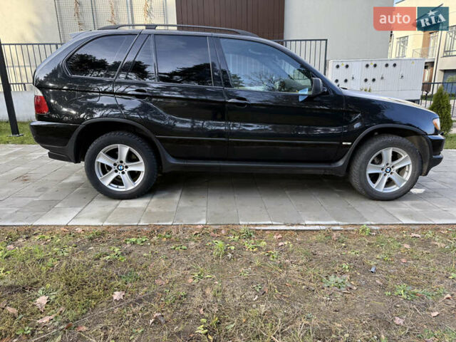 Чорний БМВ Х5, об'ємом двигуна 2.93 л та пробігом 391 тис. км за 7950 $, фото 5 на Automoto.ua