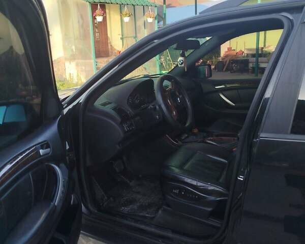 Черный БМВ Х5, объемом двигателя 2.93 л и пробегом 400 тыс. км за 9200 $, фото 5 на Automoto.ua