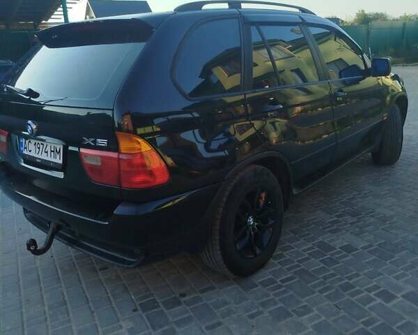 Черный БМВ Х5, объемом двигателя 2.93 л и пробегом 400 тыс. км за 9200 $, фото 4 на Automoto.ua