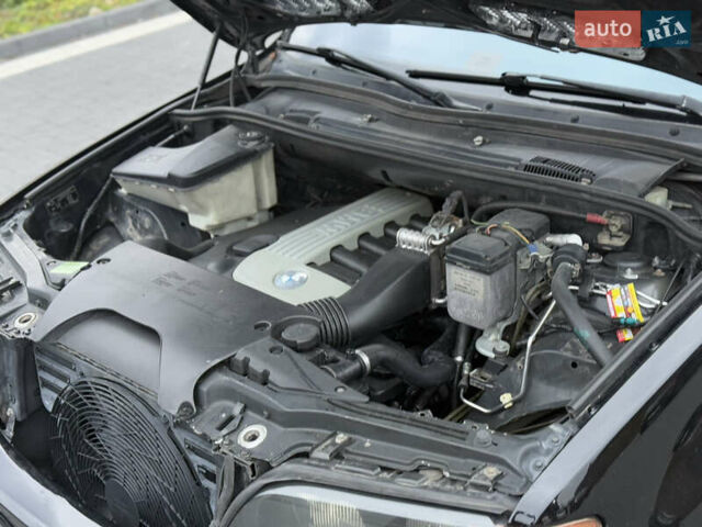 Черный БМВ Х5, объемом двигателя 3 л и пробегом 400 тыс. км за 8700 $, фото 69 на Automoto.ua