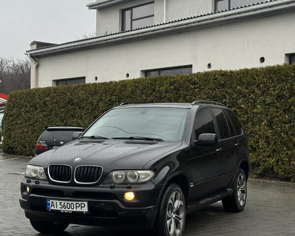 Черный БМВ Х5, объемом двигателя 4.4 л и пробегом 450 тыс. км за 7200 $, фото 1 на Automoto.ua