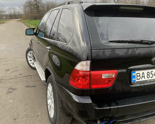 Черный БМВ Х5, объемом двигателя 2.99 л и пробегом 244 тыс. км за 12000 $, фото 6 на Automoto.ua
