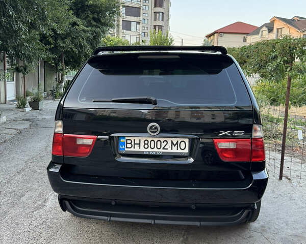 Черный БМВ Х5, объемом двигателя 2.99 л и пробегом 303 тыс. км за 13000 $, фото 6 на Automoto.ua
