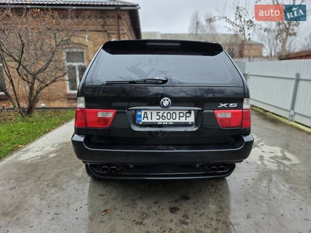 Черный БМВ Х5, объемом двигателя 4.4 л и пробегом 430 тыс. км за 6900 $, фото 24 на Automoto.ua