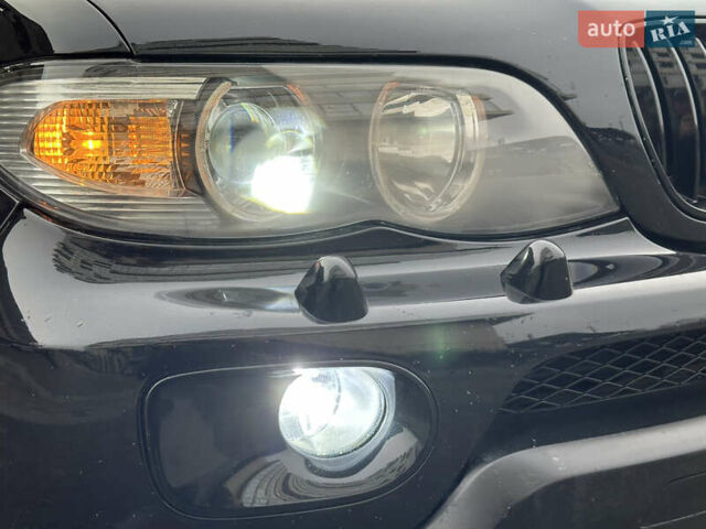 Черный БМВ Х5, объемом двигателя 4.4 л и пробегом 265 тыс. км за 10000 $, фото 4 на Automoto.ua