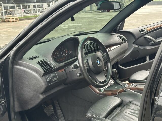 Черный БМВ Х5, объемом двигателя 4.4 л и пробегом 265 тыс. км за 11500 $, фото 7 на Automoto.ua