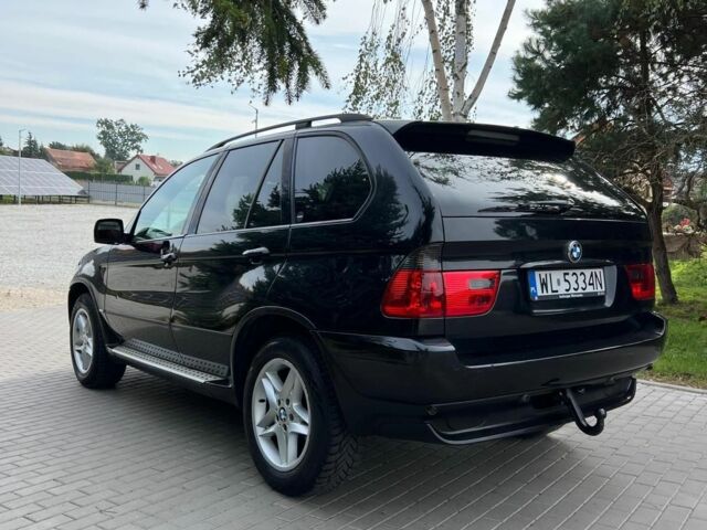 Черный БМВ Х5, объемом двигателя 3 л и пробегом 112 тыс. км за 3451 $, фото 1 на Automoto.ua