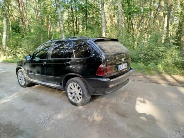 Черный БМВ Х5, объемом двигателя 3 л и пробегом 300 тыс. км за 5800 $, фото 4 на Automoto.ua