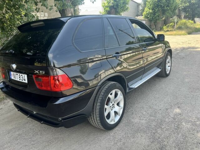 Черный БМВ Х5, объемом двигателя 3 л и пробегом 380 тыс. км за 6590 $, фото 1 на Automoto.ua