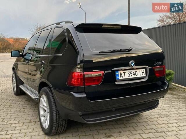 Черный БМВ Х5, объемом двигателя 3 л и пробегом 394 тыс. км за 11650 $, фото 8 на Automoto.ua