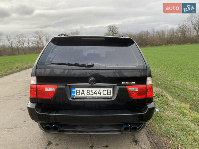 Черный БМВ Х5, объемом двигателя 2.99 л и пробегом 244 тыс. км за 12000 $, фото 5 на Automoto.ua