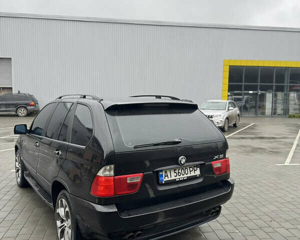 Черный БМВ Х5, объемом двигателя 4.4 л и пробегом 450 тыс. км за 7200 $, фото 7 на Automoto.ua