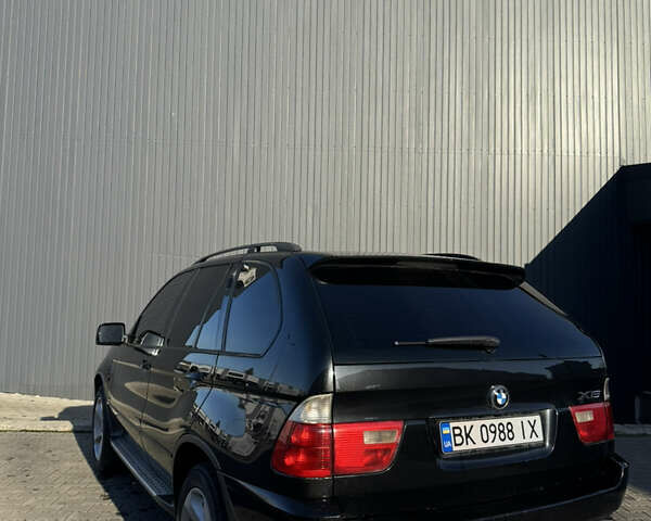 Черный БМВ Х5, объемом двигателя 3 л и пробегом 365 тыс. км за 10950 $, фото 10 на Automoto.ua