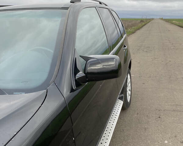 Черный БМВ Х5, объемом двигателя 2.99 л и пробегом 244 тыс. км за 12000 $, фото 4 на Automoto.ua