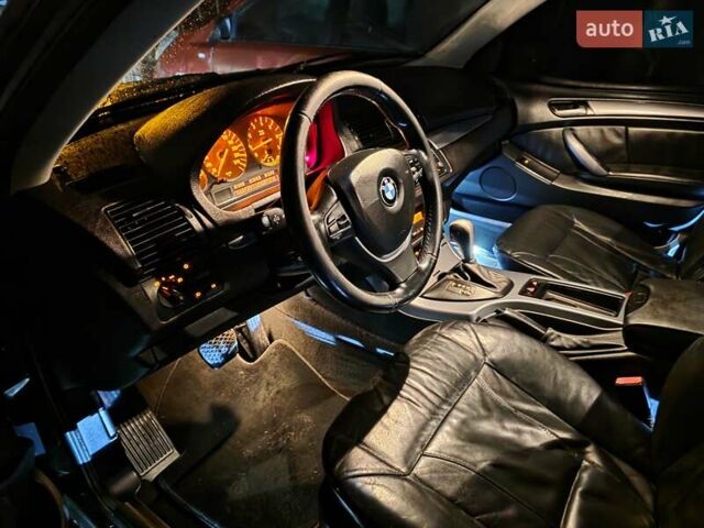 Черный БМВ Х5, объемом двигателя 4.4 л и пробегом 430 тыс. км за 6900 $, фото 4 на Automoto.ua