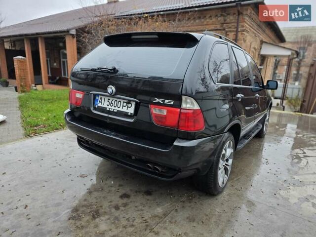 Черный БМВ Х5, объемом двигателя 4.4 л и пробегом 430 тыс. км за 6900 $, фото 25 на Automoto.ua