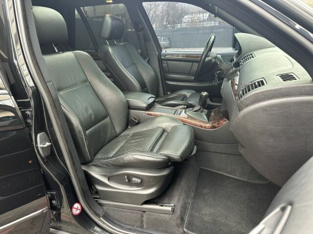 Черный БМВ Х5, объемом двигателя 4.4 л и пробегом 265 тыс. км за 11500 $, фото 20 на Automoto.ua