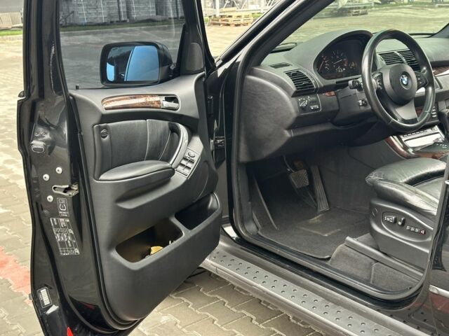 Черный БМВ Х5, объемом двигателя 4.4 л и пробегом 265 тыс. км за 11500 $, фото 6 на Automoto.ua