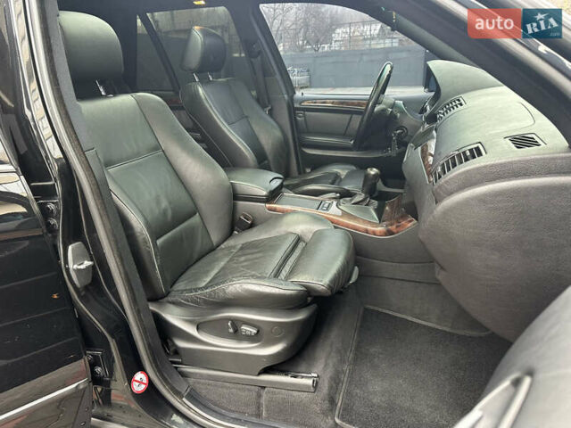 Черный БМВ Х5, объемом двигателя 4.4 л и пробегом 265 тыс. км за 10000 $, фото 42 на Automoto.ua