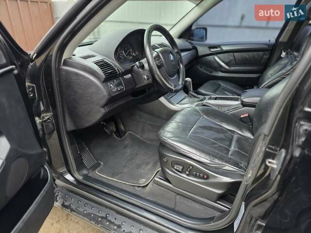Черный БМВ Х5, объемом двигателя 4.4 л и пробегом 430 тыс. км за 6900 $, фото 16 на Automoto.ua