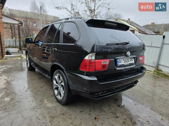 Черный БМВ Х5, объемом двигателя 4.4 л и пробегом 430 тыс. км за 6900 $, фото 23 на Automoto.ua