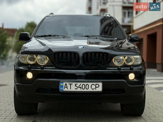 Чорний БМВ Х5, об'ємом двигуна 3 л та пробігом 350 тис. км за 11750 $, фото 5 на Automoto.ua