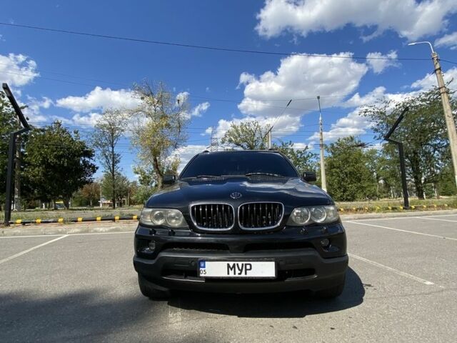 Черный БМВ Х5, объемом двигателя 3 л и пробегом 416 тыс. км за 12000 $, фото 1 на Automoto.ua