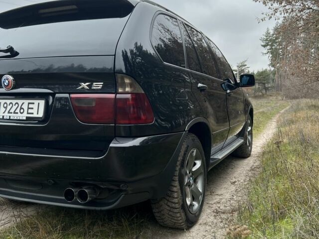 Черный БМВ Х5, объемом двигателя 3 л и пробегом 435 тыс. км за 12500 $, фото 7 на Automoto.ua