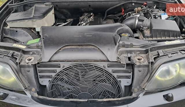 Черный БМВ Х5, объемом двигателя 3 л и пробегом 278 тыс. км за 7500 $, фото 32 на Automoto.ua