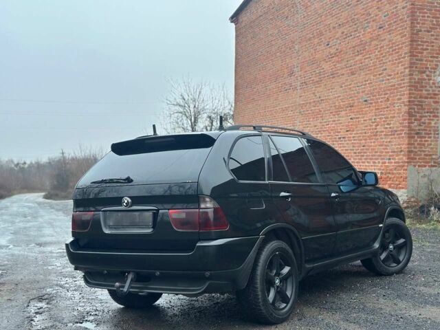 Черный БМВ Х5, объемом двигателя 3 л и пробегом 390 тыс. км за 5700 $, фото 6 на Automoto.ua