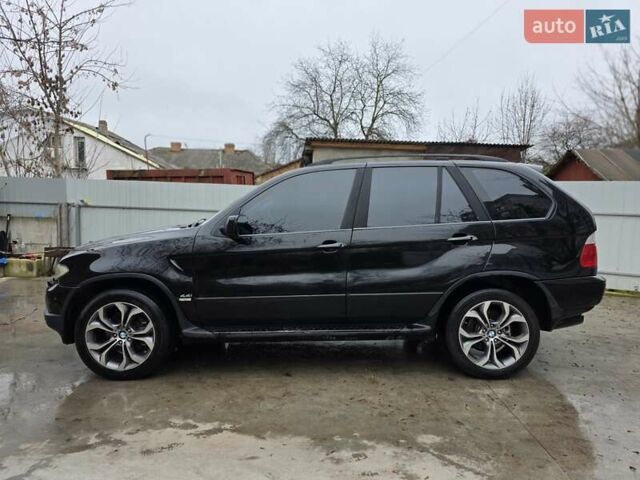 Черный БМВ Х5, объемом двигателя 4.4 л и пробегом 450 тыс. км за 6999 $, фото 16 на Automoto.ua