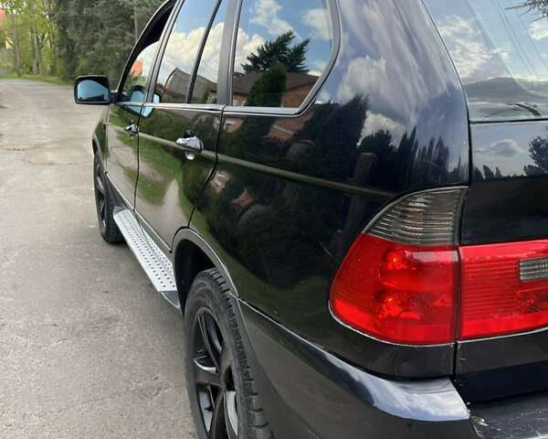 Черный БМВ Х5, объемом двигателя 3 л и пробегом 400 тыс. км за 5600 $, фото 6 на Automoto.ua