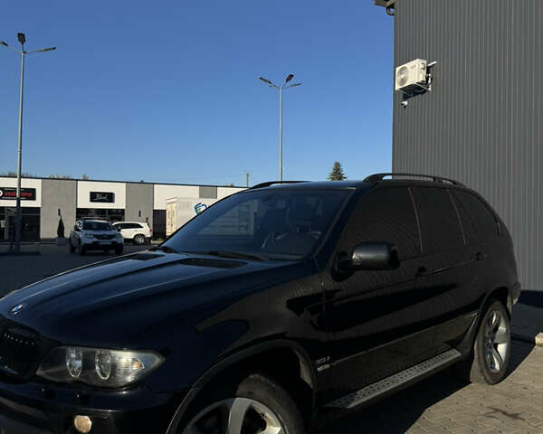 Черный БМВ Х5, объемом двигателя 3 л и пробегом 365 тыс. км за 10950 $, фото 1 на Automoto.ua