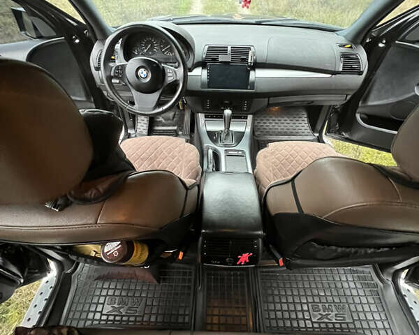 Черный БМВ Х5, объемом двигателя 3 л и пробегом 435 тыс. км за 12500 $, фото 13 на Automoto.ua