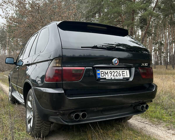Черный БМВ Х5, объемом двигателя 3 л и пробегом 435 тыс. км за 12500 $, фото 4 на Automoto.ua