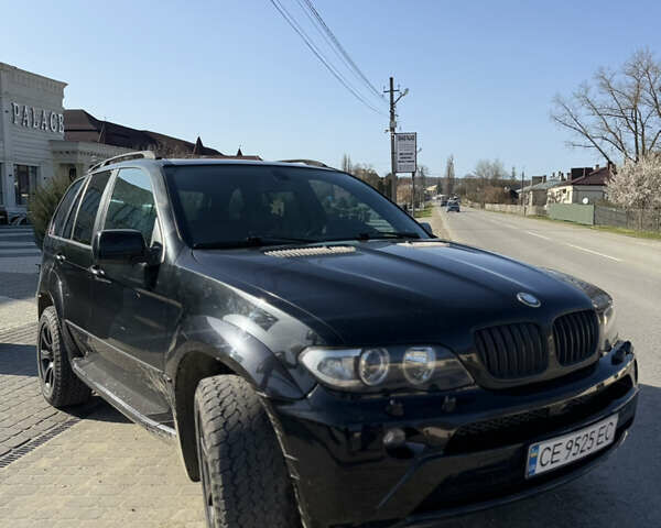 Черный БМВ Х5, объемом двигателя 2.99 л и пробегом 285 тыс. км за 12000 $, фото 1 на Automoto.ua