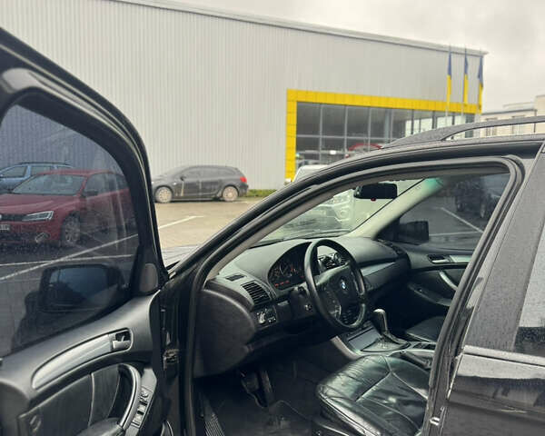 Черный БМВ Х5, объемом двигателя 4.4 л и пробегом 450 тыс. км за 7200 $, фото 12 на Automoto.ua