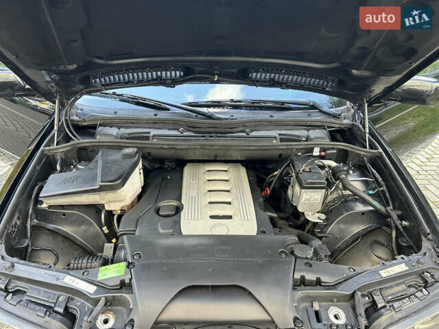 Черный БМВ Х5, объемом двигателя 2.99 л и пробегом 357 тыс. км за 10450 $, фото 95 на Automoto.ua