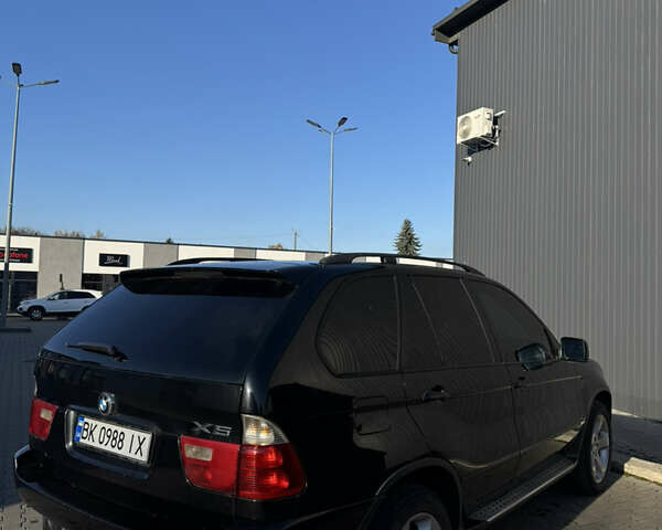 Черный БМВ Х5, объемом двигателя 3 л и пробегом 365 тыс. км за 10950 $, фото 9 на Automoto.ua