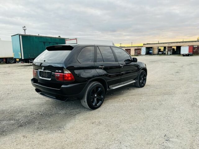 Черный БМВ Х5, объемом двигателя 3 л и пробегом 390 тыс. км за 11950 $, фото 6 на Automoto.ua