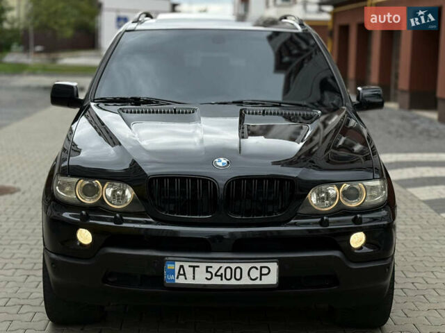 Чорний БМВ Х5, об'ємом двигуна 3 л та пробігом 350 тис. км за 11750 $, фото 4 на Automoto.ua