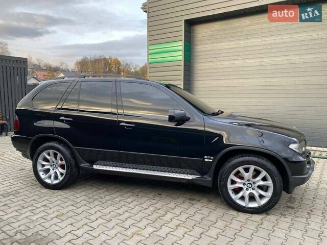 Черный БМВ Х5, объемом двигателя 3 л и пробегом 394 тыс. км за 11650 $, фото 4 на Automoto.ua