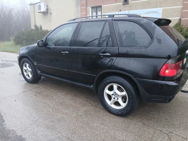 Чорний БМВ Х5, об'ємом двигуна 3 л та пробігом 260 тис. км за 4700 $, фото 4 на Automoto.ua