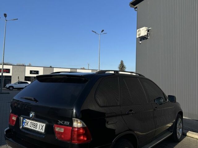 Черный БМВ Х5, объемом двигателя 3 л и пробегом 365 тыс. км за 10950 $, фото 6 на Automoto.ua