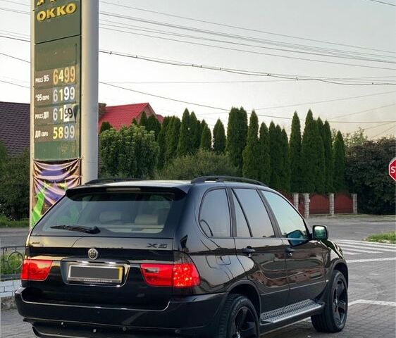 Чорний БМВ Х5, об'ємом двигуна 3 л та пробігом 300 тис. км за 7000 $, фото 4 на Automoto.ua