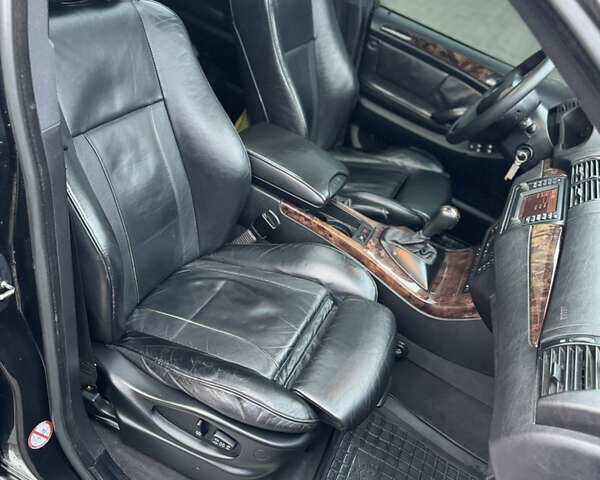 Черный БМВ Х5, объемом двигателя 3 л и пробегом 340 тыс. км за 11950 $, фото 9 на Automoto.ua