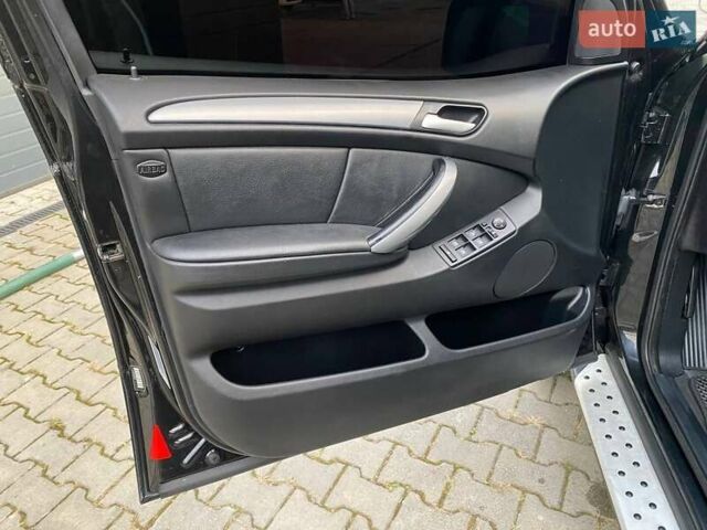 Черный БМВ Х5, объемом двигателя 3 л и пробегом 394 тыс. км за 11650 $, фото 26 на Automoto.ua