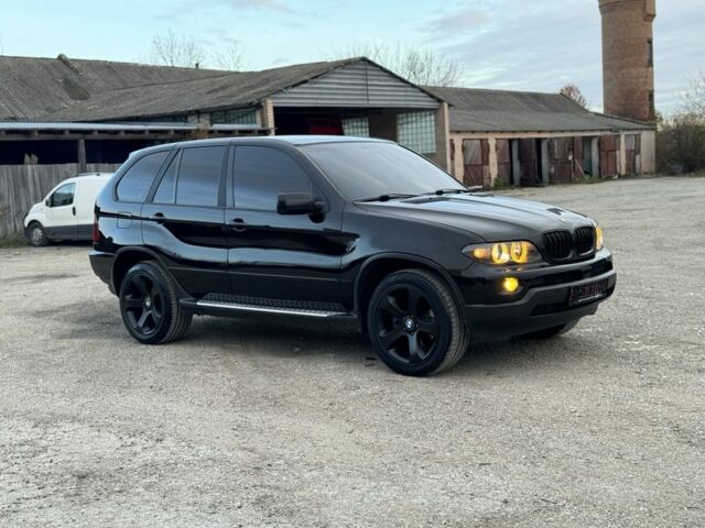 Черный БМВ Х5, объемом двигателя 3 л и пробегом 390 тыс. км за 11950 $, фото 4 на Automoto.ua