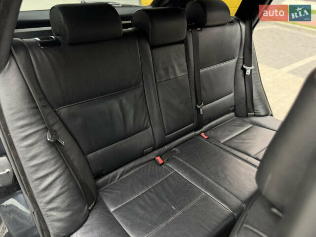 Чорний БМВ Х5, об'ємом двигуна 3 л та пробігом 350 тис. км за 11750 $, фото 48 на Automoto.ua