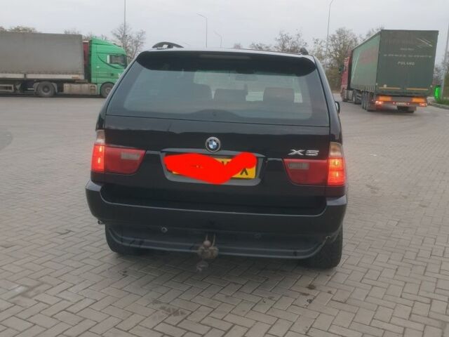Чорний БМВ Х5, об'ємом двигуна 0 л та пробігом 230 тис. км за 4398 $, фото 1 на Automoto.ua